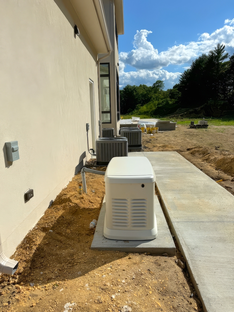 Whole-home standby generator installed beside a Utah residence