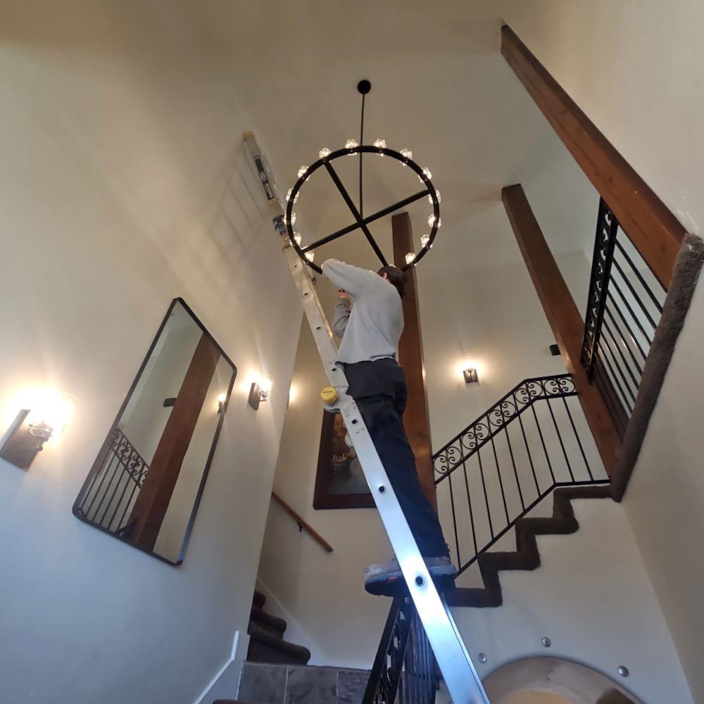 Recessed can lighting installed in a finished basement ceiling